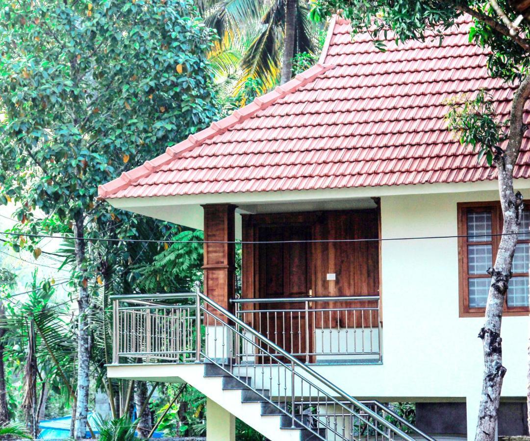 Alappuzha Aramana Holiday Inn الغرفة الصورة